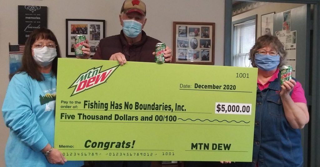 Donation check to Fishing Has No Boundaries